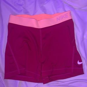 purple/ pink nike pros